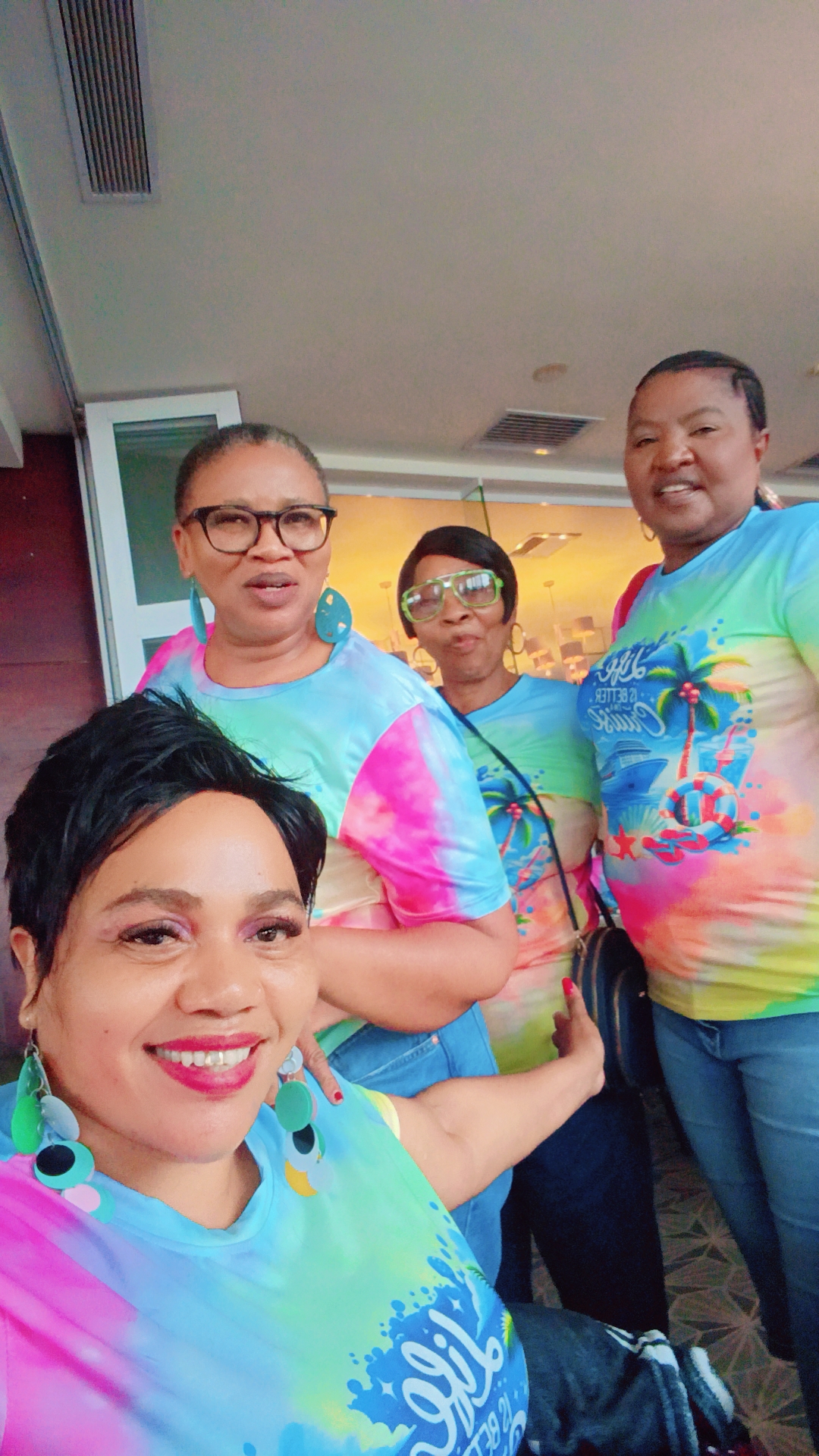 Cruise group selfie in matching holiday shirts