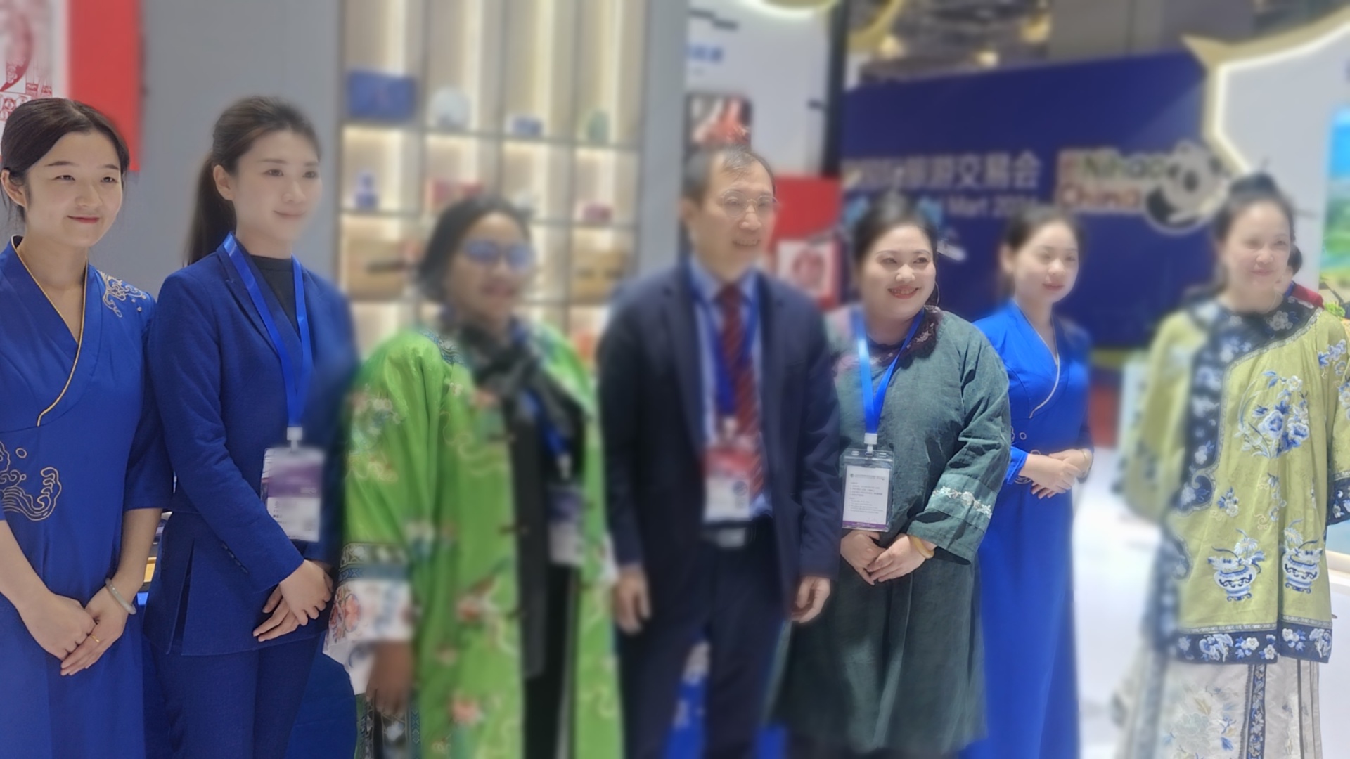 Gibby Memane among international tourism representatives in traditional dress