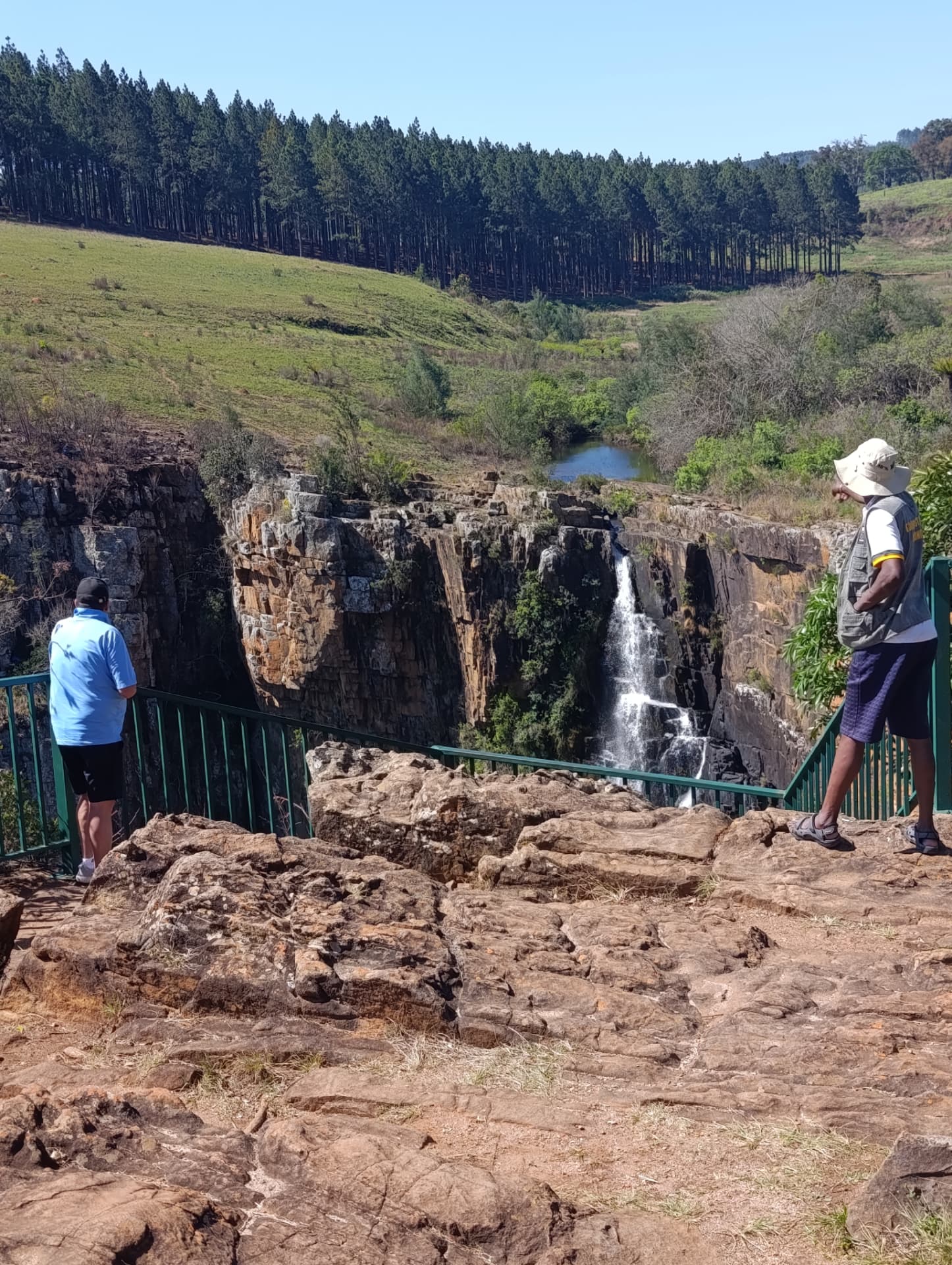 Guests at a waterfall viewpoint on the Mpumalanga escarpment